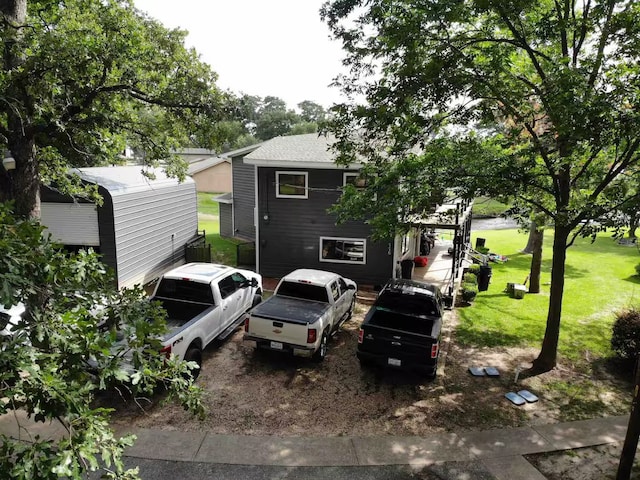 116 Summerall Dr, Mabank, TX 75156 - back of house with a lawn