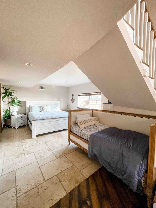 116 Summerall Dr, Mabank, TX 75156 - bedroom featuring stone tile flooring and recessed lighting