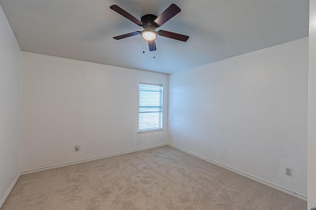 6547 Portside Ridge Ln, Dallas, TX 75249 - spare room with carpet flooring, a ceiling fan, and baseboards