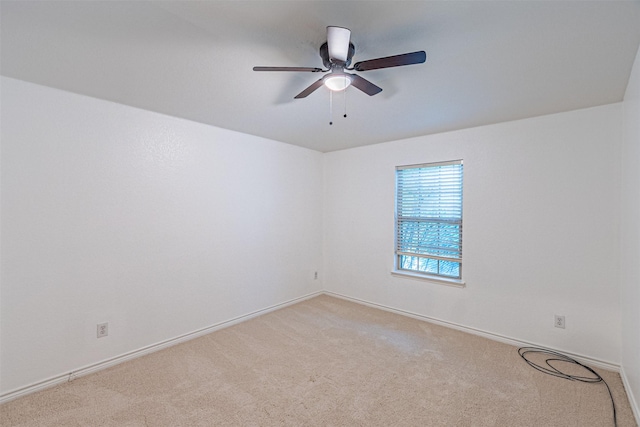 6547 Portside Ridge Ln, Dallas, TX 75249 - empty room featuring light carpet, ceiling fan, and baseboards