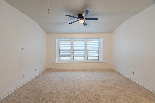6547 Portside Ridge Ln, Dallas, TX 75249 - carpeted empty room featuring baseboards, vaulted ceiling, and a ceiling fan