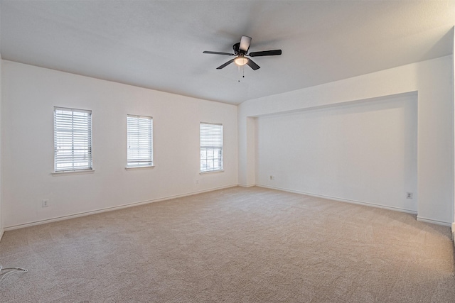 6547 Portside Ridge Ln, Dallas, TX 75249 - spare room with light colored carpet, ceiling fan, and baseboards