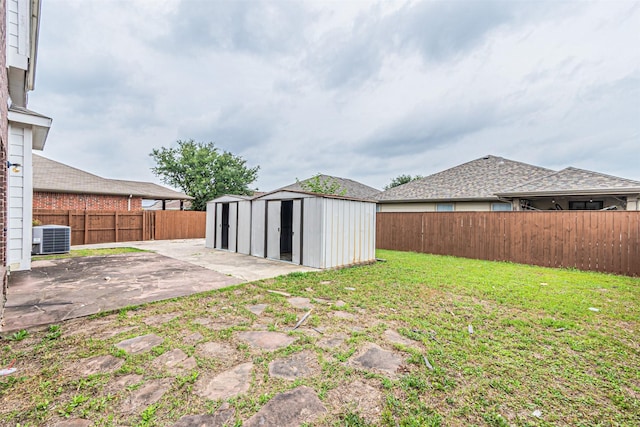 6547 Portside Ridge Ln, Dallas, TX 75249 - view of yard featuring a patio and central AC