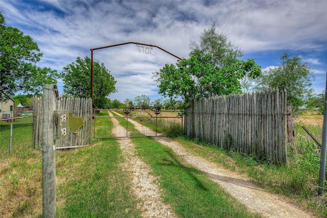 5701 Fm 2101, Quinlan, TX 75474 - view of street featuring a gate and a gated entry