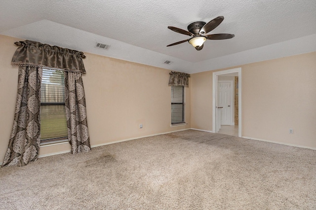 3313 Conlin Dr, Rowlett, TX 75088 - empty room with a ceiling fan, carpet floors, baseboards, and a textured ceiling