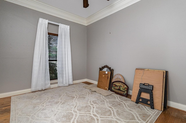 3313 Conlin Dr, Rowlett, TX 75088 - bedroom featuring wood finished floors, crown molding, baseboards, and ceiling fan