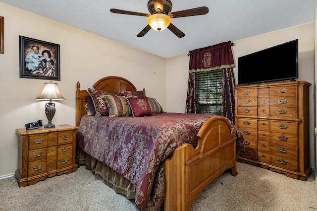 3313 Conlin Dr, Rowlett, TX 75088 - carpeted bedroom with ceiling fan and a textured ceiling
