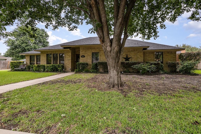 3313 Conlin Dr, Rowlett, TX 75088 - ranch-style house featuring brick siding and a shingled roof
