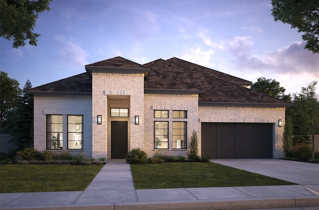 990 Stargrass Dr, Allen, TX 75013 - contemporary home featuring an attached garage, brick siding, a front yard, and driveway