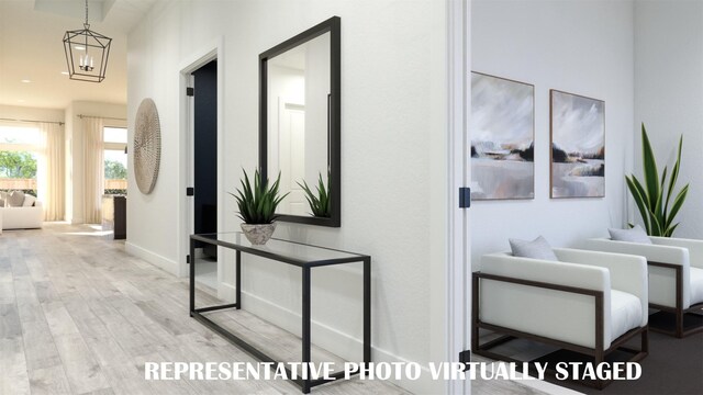 990 Stargrass Dr, Allen, TX 75013 - hallway with wood finished floors and baseboards