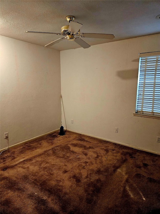 1231 Ravina Dr, Garland, TX 75041 - empty room with a ceiling fan, carpet, and baseboards