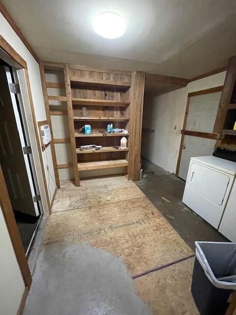 1231 Ravina Dr, Garland, TX 75041 - storage room with washer / dryer