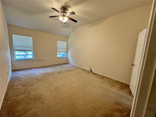 4821 Topaz Ln, Granbury, TX 76049 - carpeted spare room with ceiling fan, baseboards, and vaulted ceiling
