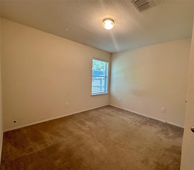 4821 Topaz Ln, Granbury, TX 76049 - carpeted empty room with a textured ceiling and baseboards