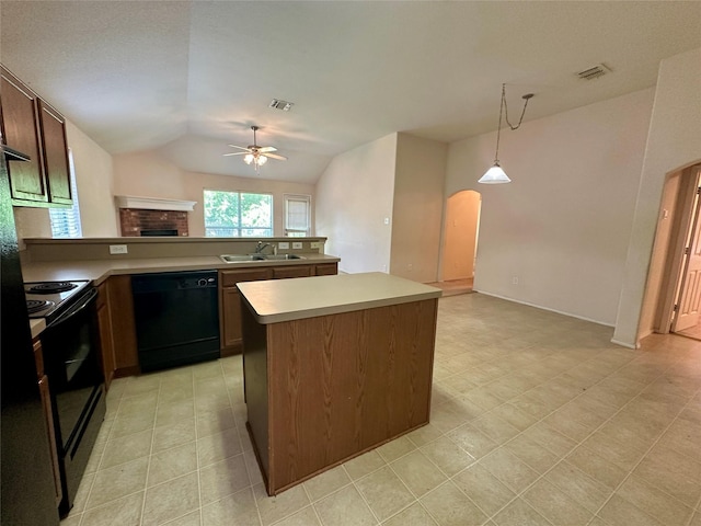 4821 Topaz Ln, Granbury, TX 76049 - kitchen featuring black appliances, a ceiling fan, arched walkways, a sink, and a fireplace