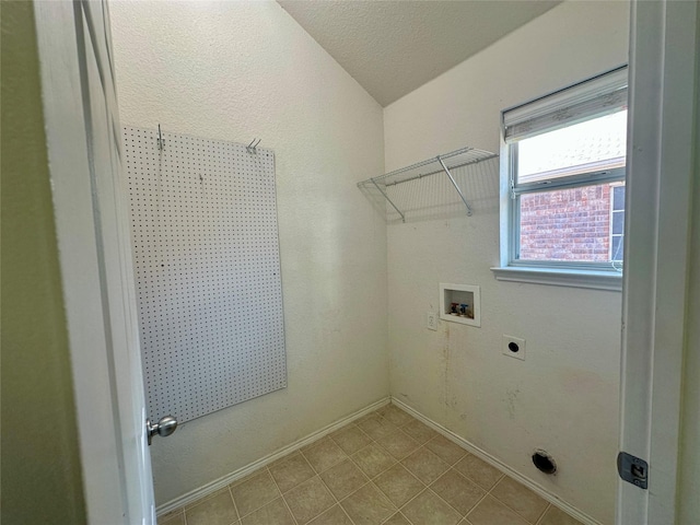 4821 Topaz Ln, Granbury, TX 76049 - laundry room with electric dryer hookup, washer hookup, and baseboards