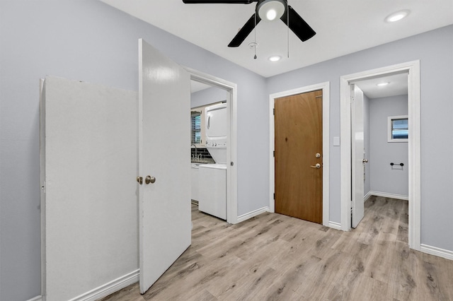 110 W Moore St, Sherman, TX 75090 - entryway with stacked washing machine and dryer, light wood-type flooring, a ceiling fan, baseboards, and recessed lighting