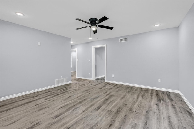 110 W Moore St, Sherman, TX 75090 - empty room with wood finished floors, a ceiling fan, baseboards, and recessed lighting