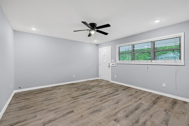 110 W Moore St, Sherman, TX 75090 - empty room featuring wood finished floors, a ceiling fan, baseboards, and recessed lighting