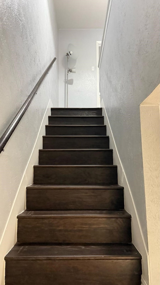 4503 N O Connor Rd Unit 1113, Irving, TX 75062 - staircase with a textured wall