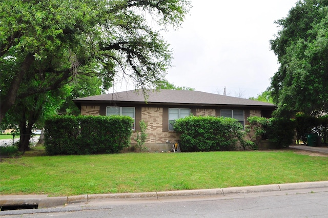 5328 Ira St N, Haltom City, TX 76117 - view of side of home with a yard and brick siding