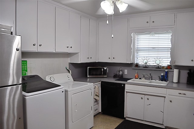 5328 Ira St N, Haltom City, TX 76117 - kitchen with appliances with stainless steel finishes, a sink, washer and clothes dryer, a ceiling fan, and white cabinetry