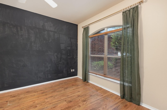 2038 La Salle Trl, Grand Prairie, TX 75052 - spare room with wood finished floors and baseboards