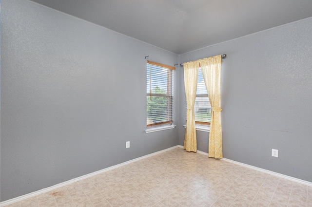 2038 La Salle Trl, Grand Prairie, TX 75052 - spare room with baseboards and light flooring