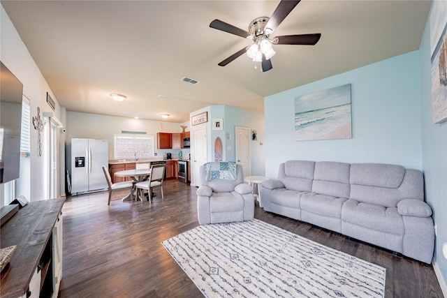 306 Breaux Ln, Mabank, TX 75147 - living area featuring a ceiling fan and dark wood-style flooring