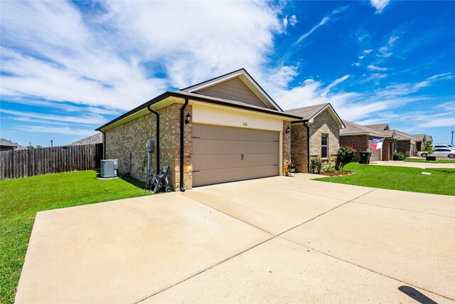 306 Breaux Ln, Mabank, TX 75147 - single story home featuring a garage, brick siding, concrete driveway, and central air condition unit
