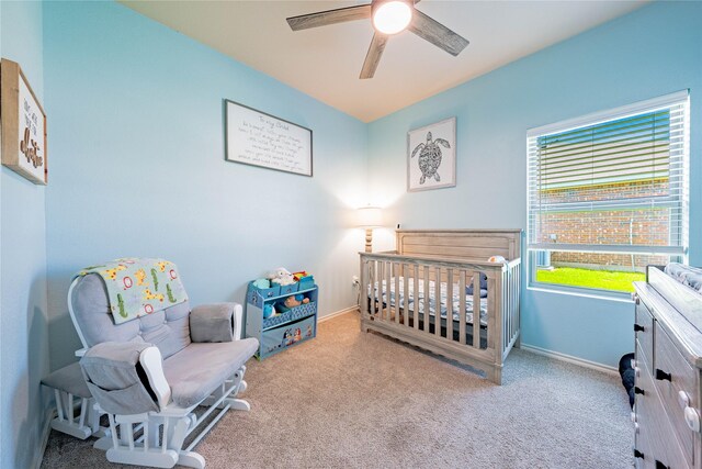 306 Breaux Ln, Mabank, TX 75147 - bedroom featuring carpet flooring, a crib, baseboards, and ceiling fan