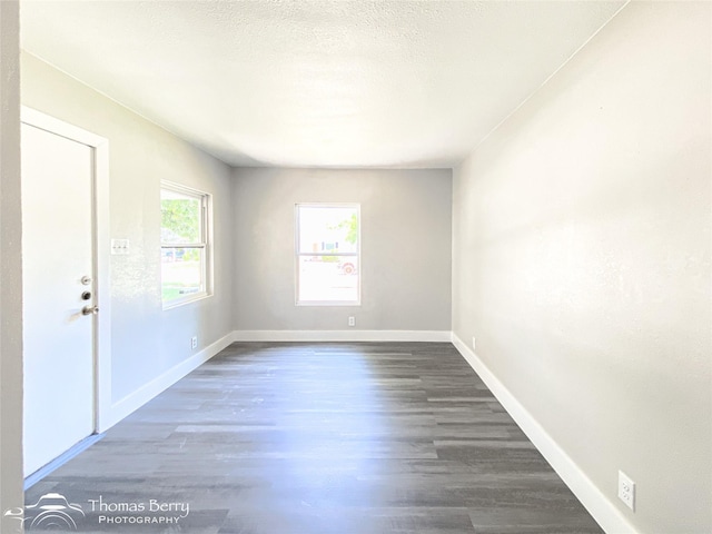 2234 Meander St, Abilene, TX 79602 - empty room featuring wood finished floors and baseboards