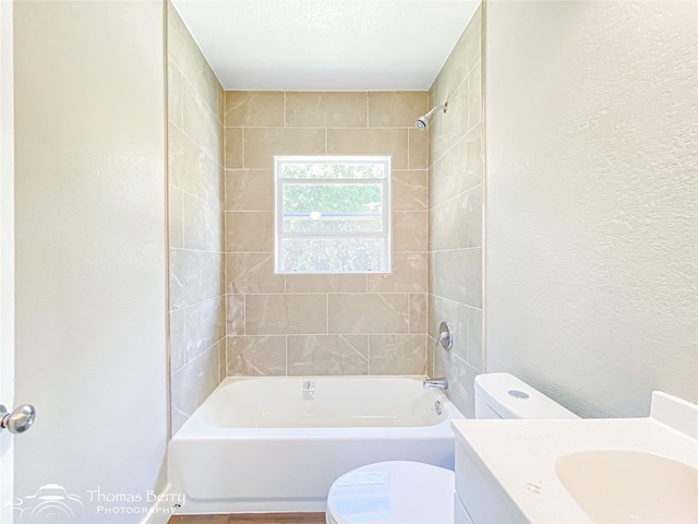 2234 Meander St, Abilene, TX 79602 - full bath featuring toilet, vanity, shower / tub combination, and a textured wall