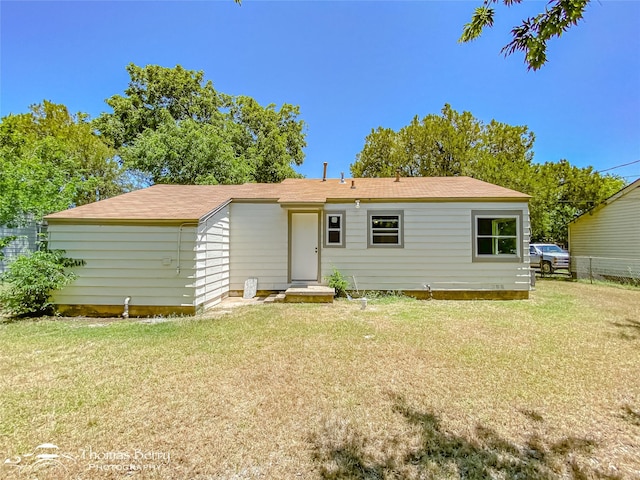 2234 Meander St, Abilene, TX 79602 - back of house with a lawn
