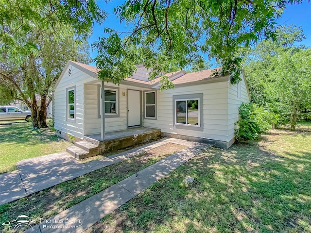 2234 Meander St, Abilene, TX 79602 - view of front of house with a front lawn and covered porch