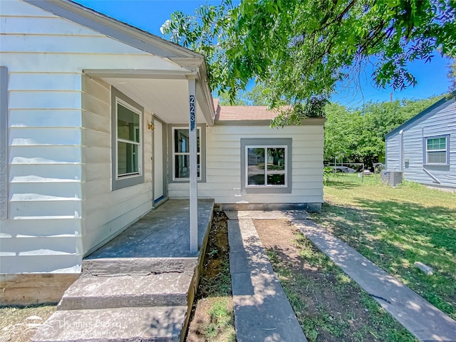 2234 Meander St, Abilene, TX 79602 - property entrance featuring central AC and a yard