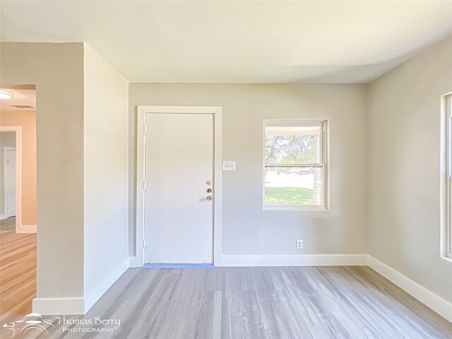 2234 Meander St, Abilene, TX 79602 - foyer with light wood-type flooring and baseboards