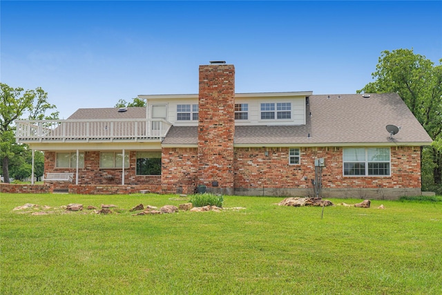 290 Berwick Rd, Jacksboro, TX 76458 - rear view of property featuring a chimney, brick siding, and a lawn
