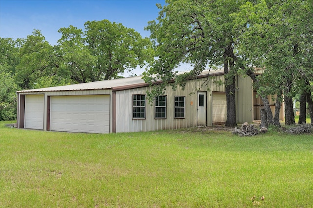 290 Berwick Rd, Jacksboro, TX 76458 - view of front of house with a garage, an outdoor structure, and a front yard
