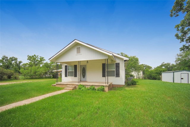 290 Berwick Rd, Jacksboro, TX 76458 - view of front of house with a porch and a front lawn