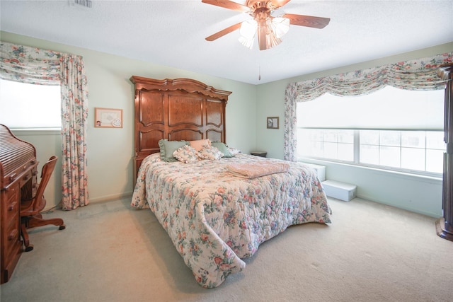 290 Berwick Rd, Jacksboro, TX 76458 - bedroom with carpet flooring, multiple windows, and a ceiling fan