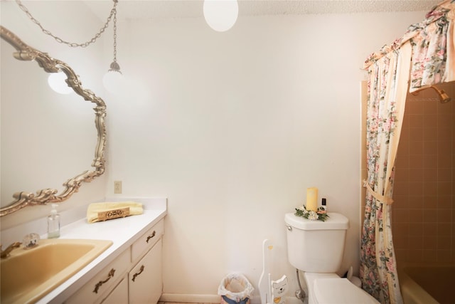 290 Berwick Rd, Jacksboro, TX 76458 - bathroom with vanity, toilet, shower / bathtub combination with curtain, and a textured ceiling