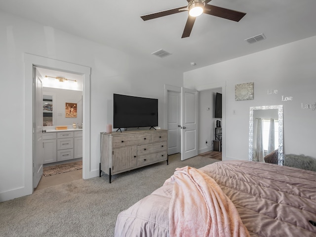 1409 Silver Marten Trl, Arlington, TX 76005 - bedroom featuring light carpet, ensuite bathroom, and a ceiling fan