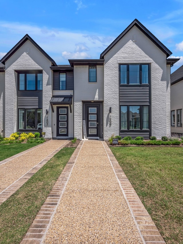 1409 Silver Marten Trl, Arlington, TX 76005 - view of front facade featuring a front lawn and brick siding