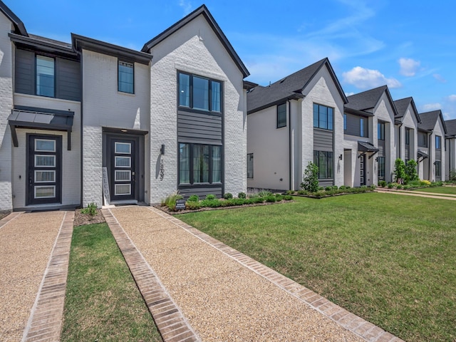 1409 Silver Marten Trl, Arlington, TX 76005 - view of front of home with brick siding, a residential view, and a front lawn