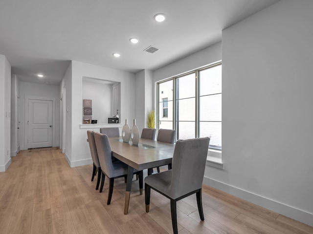 1409 Silver Marten Trl, Arlington, TX 76005 - dining room featuring light wood-style floors, recessed lighting, and baseboards
