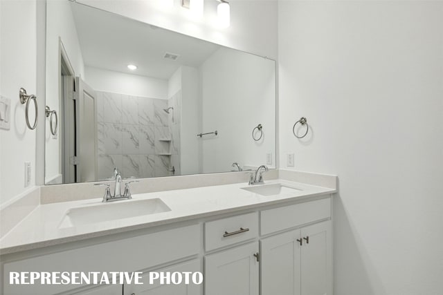 1387 Union Rd, Celina, TX 75009 - full bath with double vanity, a tile shower, and recessed lighting