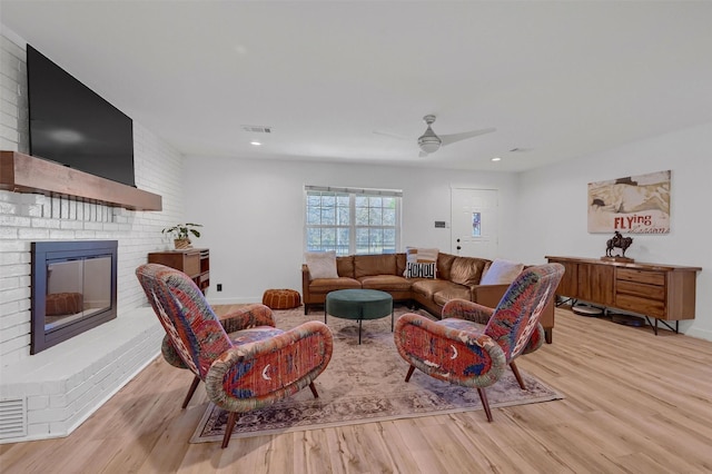 4491 Dugan Chapel Rd, Bells, TX 75414 - living room with light wood finished floors, ceiling fan, a fireplace, baseboards, and recessed lighting