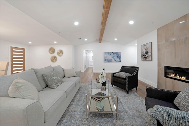 2520 Delmar Dr, Plano, TX 75075 - living room with wood finished floors, recessed lighting, and a large fireplace