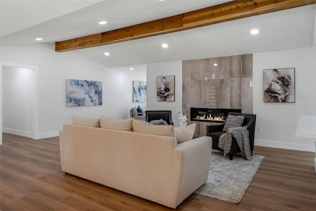 2520 Delmar Dr, Plano, TX 75075 - living room with wood finished floors, a large fireplace, and recessed lighting